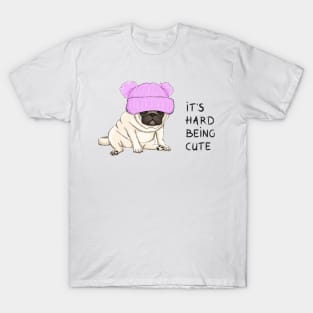 funny pug puppy dog sitting down with pink knitted hat and text its hard being cute T-Shirt